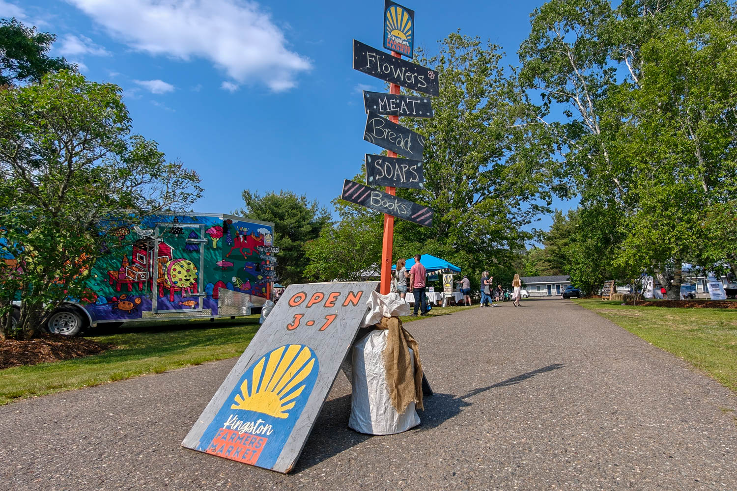 The sign for the Kingston Farmers Market during the summer months