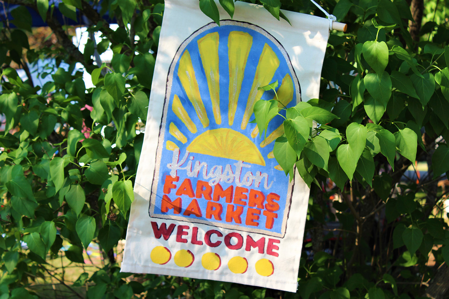 A sign for the Kingston Farmers Market